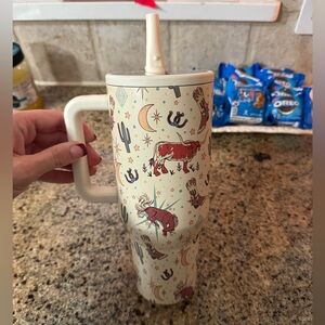 Lightly used hydro jug water bottle with fold down straw